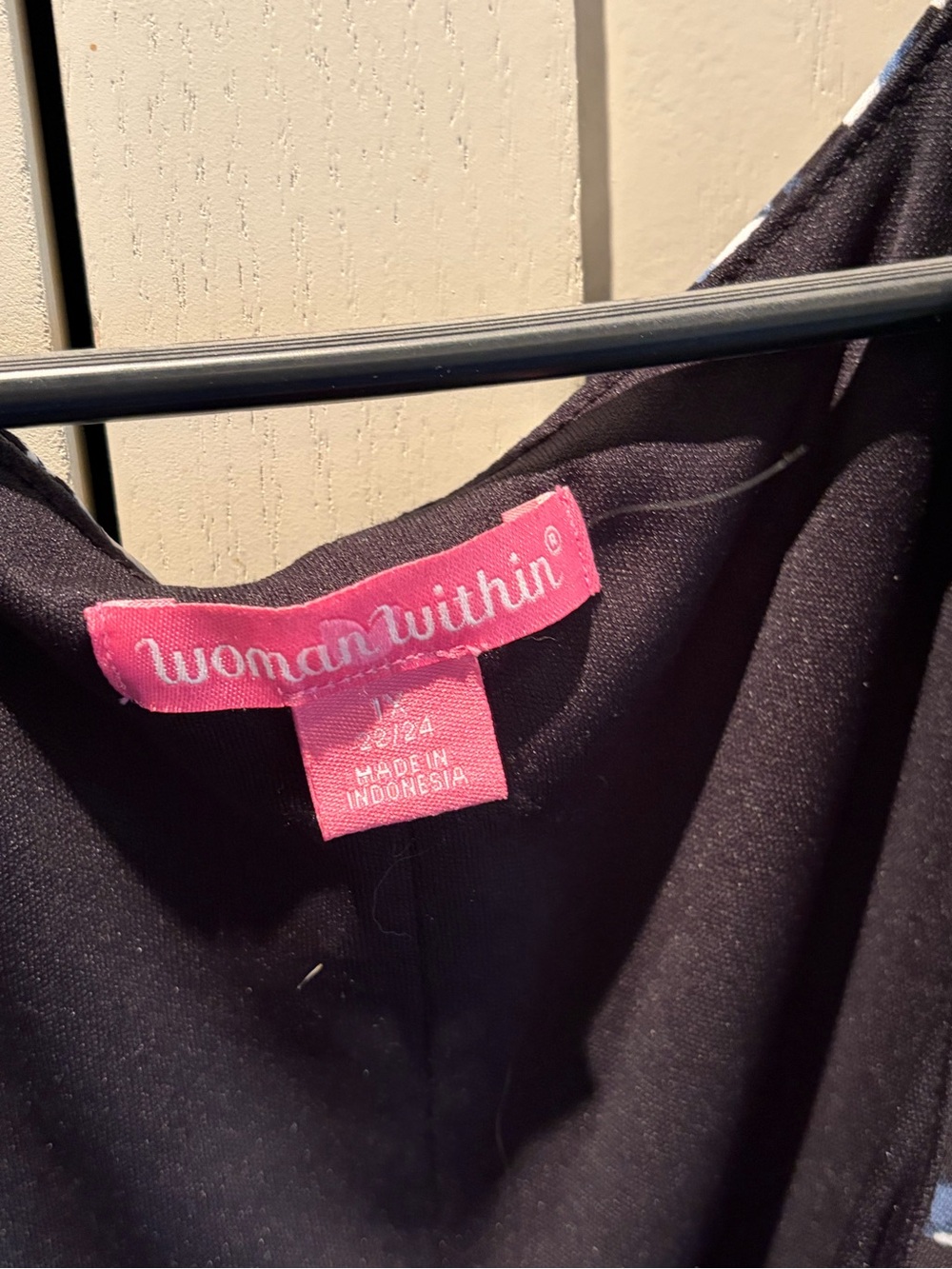 Woman Within Black Dress with Pink Brand Tag - Picture 3 of 4